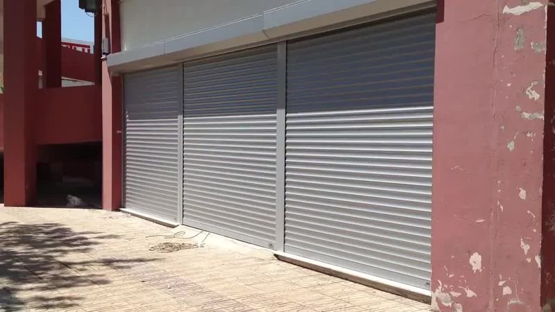 أبواب محلات بشتر معدني