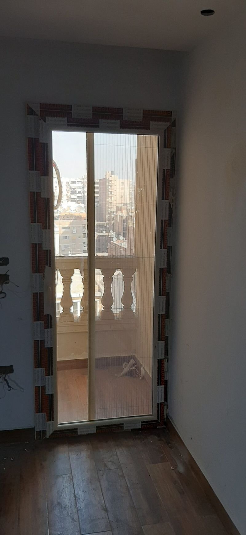 باب UPVC بضلفتين على شرفة